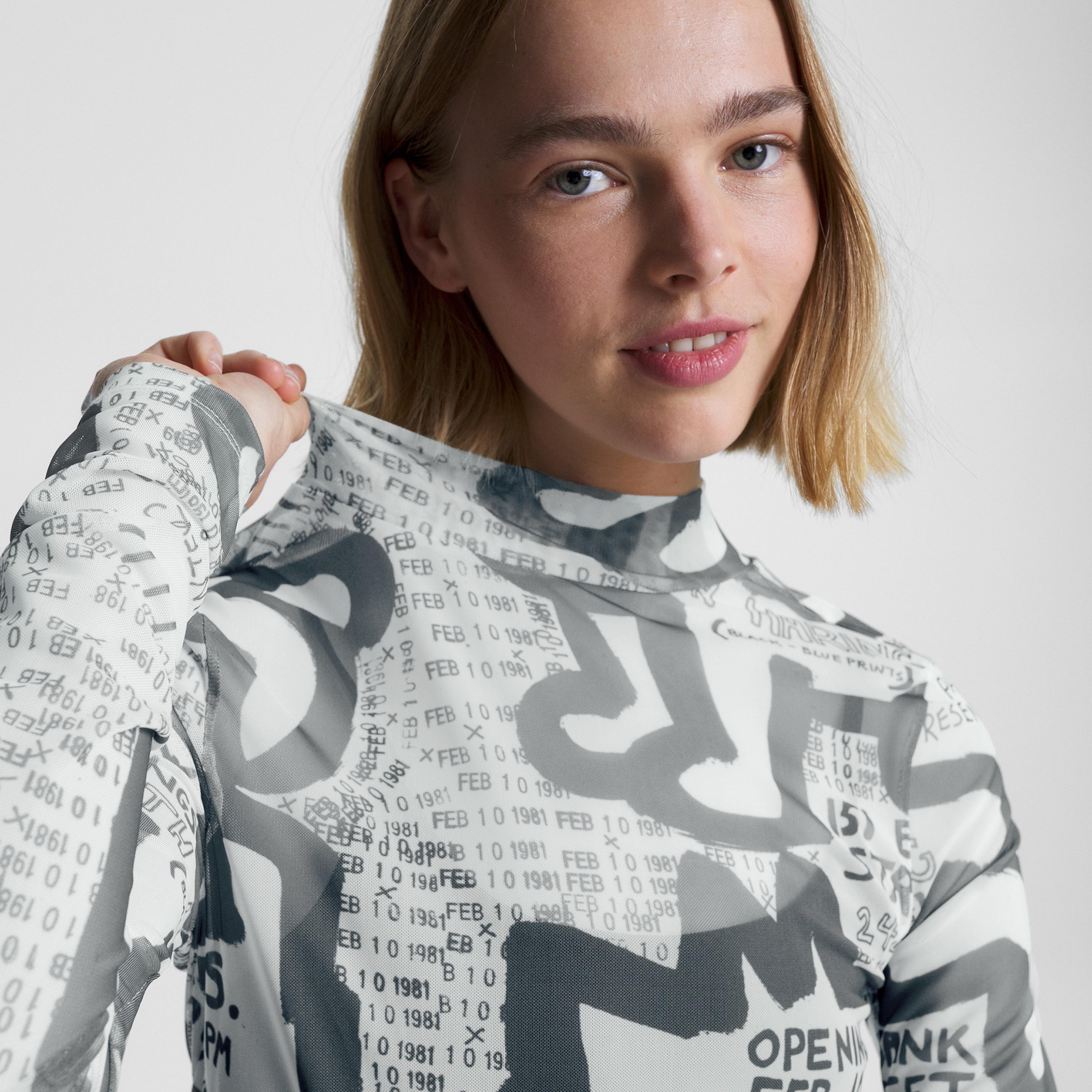 Tommy Jeans X Keith Haring Exhibit Poster Mesh Top Kadın Bej Uzun Kollu T-Shirt